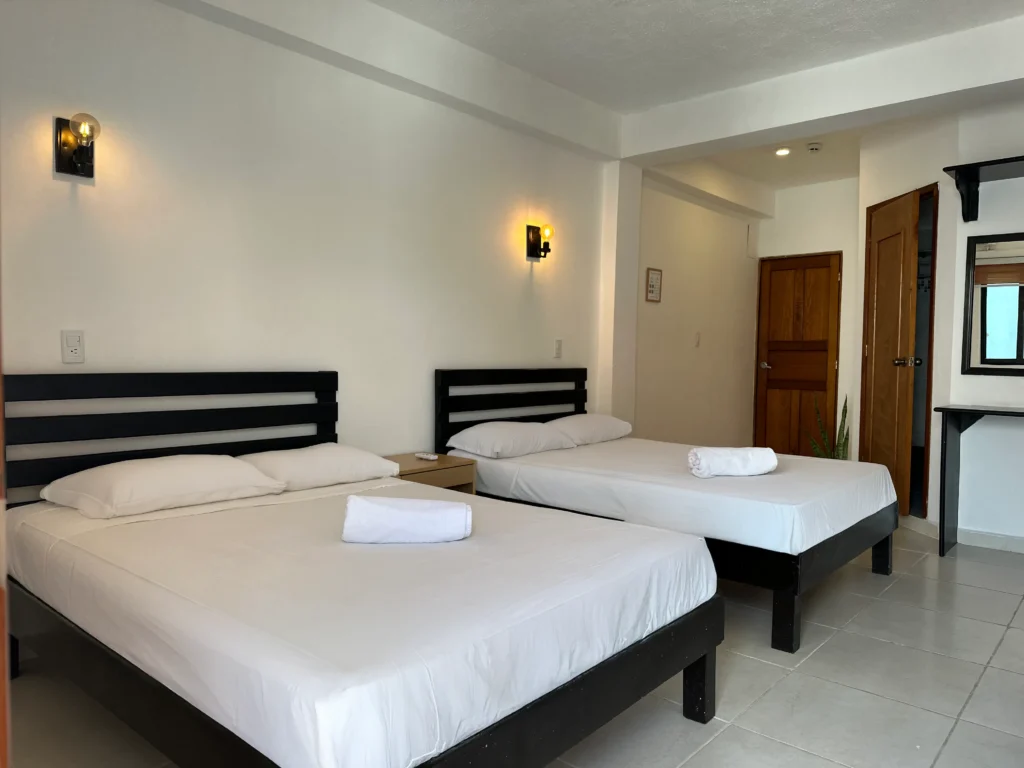 Habitación en Calma Chicha Rooms Playa del Carmen - Cuadruple Bahia